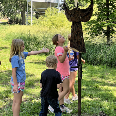 Checking out the Monk in the M. T. Liggett Sculpture Park at Volland